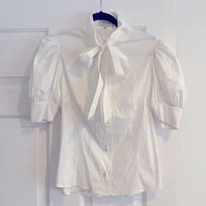 Super cute bottom tie front blouse.